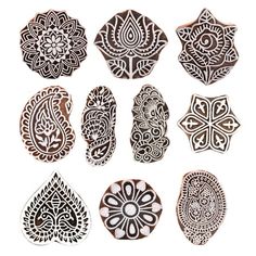 an assortment of intricately designed wooden stamps