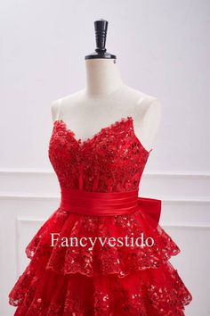 Expertly crafted with a strapless neckline and corset bodice, this stunning red dress will hug and flatter your figure. The ruffle skirt adds a touch of whimsy and the bow embellishment brings a feminine charm. Perfect for homecoming or any special occasion. ♡ SKU: FV12905 ♡ Fabric: Tulle ♡ Silhouette: A-Line ♡ Back Style: Zipper Back ♡ Embellishment: Bow Embellishment. ♡ Fully lined & Built with bra ♡ Size: US 2-16. True to the size chart. Check our Size Chart to get your correct size. ♡ Beside Strapless Red Corset Dress With Corset Back, Sleeveless Ruffled Corset Dress For Banquet, Sleeveless Corset Dress With Ruffles For Banquet, Red Corset Dress For Gala With Corset Back, Red Corset Back Dress For Gala, Red Corset Dress For Gala During Prom Season, Red Corset Dress With Corset Back For Gala, Red Corset Dress For Gala, Red Strapless Dress With Corset Back