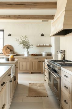 a large kitchen with wooden cabinets and white counter tops, an area rug on the floor