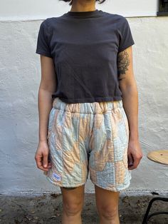 These gender-neutral shorts are made from a repurposed quilt. Featuring side seam pockets and one pocket on the back right side is big enough for your phone and small wallet. Measurements: Waist: 30-46 inches (fully slack to fully stretched) Hips: 46 inches Inseam: 6 inches Brown Cotton Shorts With Multiple Pockets, High-waisted Cotton Shorts With Multiple Pockets, Tan Quilt, Vintage Brown Cotton Shorts, Repurposed Quilt, 90s Cotton Bottoms With Built-in Shorts, Cotton Shorts With Hip Pockets And 5-inch Inseam, Small Wallet, Right Side