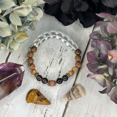 🤎 EARTH CONNECTION & GROUNDING - Balance Your Mind 🖤 It's soothing colors will help bring you more peace of mind 😌 Made with Love & Light: - faceted picasso jasper - smoky quartz - brown fire agate - clear quartz - wood - Fits 7" wrist - stretch to fit ----- My favorite meditation bead mantra: "Om Mani Padme Hum" (ohm-mah-nee-pahd-may-huum) This is a simple yet effective mantra to use during your meditation with our beads. "Om Mani Padme Hum" is a commonly used mantra. This manta has been kno Spiritual Beaded Bracelets For Healing, Spiritual Hand-strung Wristband For Friendship, Spiritual 8mm Beads Wristband For Healing, Spiritual Round Beads Hypoallergenic Bracelet, Spiritual Hypoallergenic Round Beads Bracelets, Spiritual Hypoallergenic Bracelets With Round Beads, Everyday Spiritual Beaded Crystal Bracelet, Spiritual Brown Crystal Bracelet With 8mm Beads, Nature-inspired Beaded Healing Bracelet