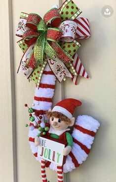 an elf is hanging on the front door