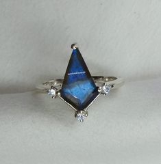 Vintage kite cut blue Labradorite Ring engagement wedding 925 Sterling Silver Handmade Rings ,Gemstone women anniversary Gift For Her, Ring Metal: 925 Sterling Silver Ring Metal Finish: Smooth Shiny Genuine Natural Labradorite  Moss Agate Collection  https://www.etsy.com/shop/SilverOceanPoint?ref=seller-platform-mcnav§ion_id=39011648 Tourmaline & Ruby Collection  https://www.etsy.com/shop/SilverOceanPoint?ref=seller-platform-mcnav§ion_id=40796420  Turquoise Collection  https://www.etsy.com/shop/ Sapphire Gemstone Ring, Trillion Cut, Sterling Silver Trillion Cut Diamond Promise Ring, Trillion Cut Sterling Silver Diamond Promise Ring, Trillion Cut Sapphire Gemstone Ring, Trillion Cut Sterling Silver Ring With Gemstone, Silver Ring With Trillion Diamond Cut, Sterling Silver Diamond Ring With Trillion Cut, Silver Trillion Cut Sapphire Ring With Accent Stones, Blue Trillion Cut Sterling Silver Ring