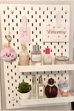 a shelf filled with lots of different types of cosmetics and personal care items on it