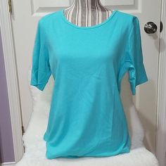 Blair Women T-Shirt Blue Size M %60 Cotton %40 Polyester Pit To Pit 20-Inch Shoulder To Hem 29 " Sleeve 9" Front Hemline Longer Than Back Soft, Stretchy, Breathable, Comfortable, Lightweight, Perfect For Summer Days Casual Every Day Wear Machine Wash Cold Extremely Lightweight Comfortable New Without Tags But Still In Its Package Has Never Been Used. Perfect Condition Light Blue Stretch Crew Neck Top, Blue Stretch Short Sleeve Top For Summer, Light Blue Stretch Short Sleeve Tops, Stretch Blue Short Sleeve Top For Summer, Basic Blue Stretch Tops, Basic Stretch Blue Tops, Light Blue Stretch Basic Top, Blue Stretch Short Sleeve Shirt, Mint Green Tops