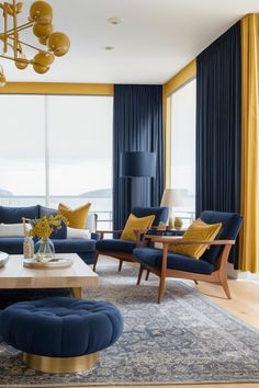 a living room filled with blue and yellow furniture