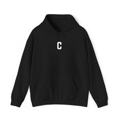 Stay cozy and stylish with our Letter C Print Unisex Heavy Blend™ Hooded Sweatshirt. This minimalist design is perfect for the autumn and winter seasons, offering a clean and modern look. A thoughtful gift for anyone who loves simplicity and comfort, this pullover jacket is a wardrobe staple that combines warmth with understated elegance. Color Accuracy: Please note that actual item colors may differ slightly. This is because computer monitors and phone screens can display colors differently, and individual perception of color varies. While I strive to make my photos as true to life as possible, the color you see on your screen may not perfectly match the item's actual color. Care Instructions: - Do not dry clean - Machine wash: warm (max 40C or 105F) - Do not bleach - Tumble dry: low heat Cozy Fleece Hoodie With Letter Print, Cozy Hoodie With Letter Print, Cozy Hooded Hoodie With Letter Print, Cozy Hoodie With Letter Print For Streetwear, Cozy Letter Print Hoodie Sweatshirt, Cozy Winter Hoodie With Letter Print, Cozy Hooded Sweater With Letter Print, Winter Cotton Hoodie With Branding, Sporty Branded Hoodie For Winter