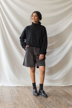 Our classic boucle knit jumper, with a roll neck and made from a 60% wool mix; perfect for layering in the chillier months. Features a flecked detail to the knit, an unbalanced hemline, dropped shoulder sleeves and a small Olive tab stitched to one side of the seam. The boucle is boxy in cut and is made for a relaxed and slouchy fit. Queer Clothes, Fresh Aesthetic, Identity Crisis, Black Turtleneck, Women's Wear, Fall Looks