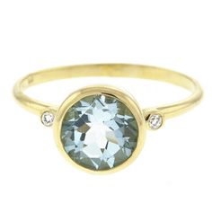 A modern classic, this ring features a sparkly round blue topaz stone and two diamond accents bezel set in solid 14k yellow gold. **This ring can be set with any color gemstone, please don't hesitate to contact us for free price estimate. Details: - 14k yellow gold - Natural blue topaz - Natural round diamonds (0.02 ct tw) Thank you for visiting our shop. Raven Fine Jewelers Stackable Birthstone Rings, White Gold Diamond Bracelet, Yellow Rings, Bezel Set Ring, Blue Ring, Wedding Rings Rose Gold, Blue Topaz Stone, Bracelets Gold Diamond, Swiss Blue Topaz