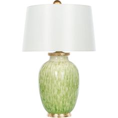 a green lamp with a white shade on the base and a gold trim around it