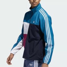 Genuine Adidas Originals Asymm Full Zip Track Jacket Colour: Active Teal / Berry Brand New With Tags 100% Authentic - Free Delivery Panelled In A Palette Of Blue, Pink And White, This Adidas Track Top Is A Pure Cotton Piece That Proves That Opposites Really Do Attract. Made Up Of Contrasting Patterns And Fabrics To Create A Striking Look, The Zipped Piece Is Completed With A Pair Of Practical Front Pockets. 100% Cotton Recycled Polyester Panels Stand Collar Zip Closure Blue Adidas Windbreaker For Sports, Adidas Blue Track Jacket For Streetwear, Blue Adidas Sports Windbreaker, Winter Blue Track Jacket With Pockets, Blue Track Jacket With Pockets For Fall, Blue Adidas Sporty Windbreaker, Adidas Blue Sporty Windbreaker, Sporty Blue Adidas Windbreaker, Adidas Navy Long Sleeve Track Jacket