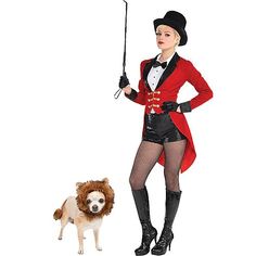 a woman in a red coat holding an umbrella next to a dog