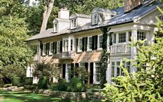 a large white house with lots of windows