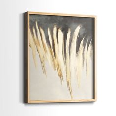 an abstract painting hangs on the wall