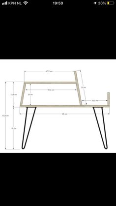 a table with some black legs and measurements for it to be made into a coffee table