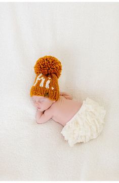 Baby will greet the world with the intarsia 'hi' on this chunky, pom-topped knit hat, but baby's first word will likely be 'cozy.' 80% acrylic, 20% wool Hand wash, dry flat Made in the USA of imported materials Babies First Words, Pom Pom Hat, Knit Hat, Knitted Hats, Poppies, Pom Pom, Crochet Hats, Hand Wash, Nordstrom