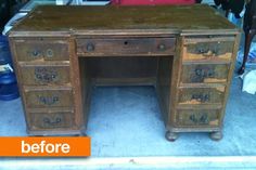 an old wooden desk with drawers in a storage area next to other furniture and tools