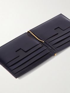 TOM FORD's billfold wallet has a centre sleeve, six slots and a gold-tone money clip to keep everything organised. It's crafted from glossy croc-effect leather and stamped with the brand's logo. Designer Gold Bifold Wallet, Designer Gold Wallets For Business, Gold Rectangular Wallets For Business, Rectangular Gold Wallet For Business, Modern Gold Wallet For Formal Occasions, Modern Gold Wallets For Formal Occasions, Classic Gold Bifold Wallet, Gold Bifold Wallet For Formal Occasions, Classic Bifold Wallet With Gold-tone Hardware