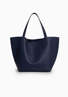 Easily carry it all in the Everyday Soft Tote by Mansur Gavriel. Crafted from supple Italian calf leather, reinforced handles, and room for a 16” laptop, it's your versatile and spacious companion. Composition: 100% Italian Soft Calf Leather Dimensions: 21.5 x 11.8 x 9 in Handle drop: 9.8" Made in Italy Vintage Wedding Gifts, Farmhouse Pottery, Louise Roe, Accessories Bags Shoes, Nyc Trip, Mansur Gavriel, Linen Shop, Summer Staples, Summer Essentials