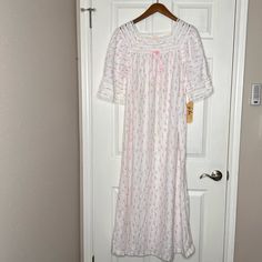 Vintage Val Mode Floral Nightgown Nightie Lace Trim Size Medium New W/Tag. Gown Is 80% Acetate, 20% Nylon, With Strips Of Lace Insert Pattern Around Shoulder And Chest. White Background With Floral Pattern. Approximately 54” Long. Arm To Arm 21” See All Pictures They Are Part Of Description. White Lace Trim Sleepwear For Home, Feminine Lace Trim Nightgown For Overnight, White Nightgown For Spring Bedtime, White Cotton Nightgown For Overnight, White Spring Nightgown For Sleep, Feminine White Nightgown For Sleepovers, White Lace Trim Sleepwear For Sleepover, White Cotton Nightgown For Sleepwear, White Lace Trim Nightgown For Overnight