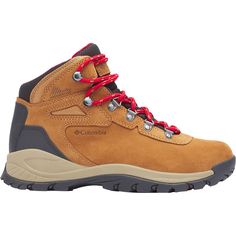 a pair of brown hiking boots with red laces on the outstretches