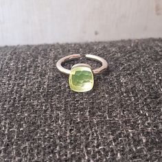 Pomellato Design Ring Peridot Gemstone 925 Sterling Silver Ring For Women Three Micron Plating Product Detail :-- Metal :- 925 Sterling Silver Gemstone :- Created Peridot Main stone creation :- Created  Ring Size :- Choose Variation Metal Purity : 925 parts per 1000 Wholesale requests are welcome. **Please see our policies section for shipping and return information. Feel free to contact me with any questions or request Lime Green Gemstone Ring Jewelry, Lime Green Sterling Silver Rings As Gift, Lime Green Gemstone Ring, Lime Green Sterling Silver Rings For Gift, Faceted Sterling Silver Gemstones, Adjustable Faceted Sterling Silver Gemstones, Green Sterling Silver Stackable Crystal Ring, Green Stackable Sterling Silver Crystal Ring, Adjustable Green Crystal Gemstone Ring