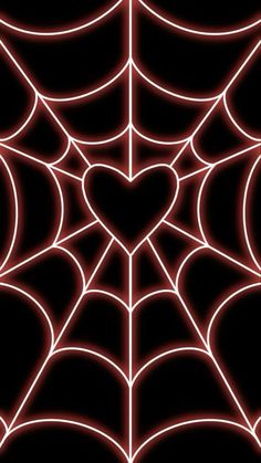 a spider web with a heart in the center