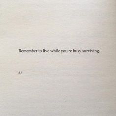 an open book with the words remember to live while you're busy surviving