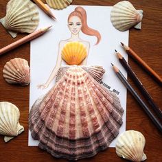 a drawing of a woman in a dress is surrounded by seashells and pencils