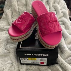 Karl Lagerfeld Paris Kamara Logo Sandals Nib Shocking Pink Color Puffy Quilted With Logo Detailed Rope Boarder On Sandals Accented With Pink Leather Chain Detail Leather Upper So Cute And Comfy Comes From A Smoke And Pet Free Environment Pink Slip-on Sandals With Textured Sole, Pink Textured Sole Slip-on Sandals, Pink Sandals With Textured Sole And Round Toe, Pink Sandals With Woven Sole, Pink Synthetic Sandals With Woven Sole, Karl Lagerfeld Shoes, Shocking Pink, Paris Woman, Karl Lagerfeld Paris