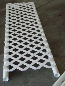 a white plastic mat sitting on the ground