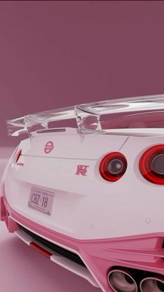 the rear end of a white and pink sports car with red brake lights on it