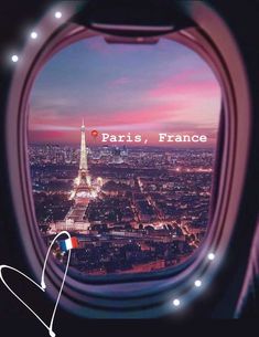 an airplane window with the eiffel tower in paris