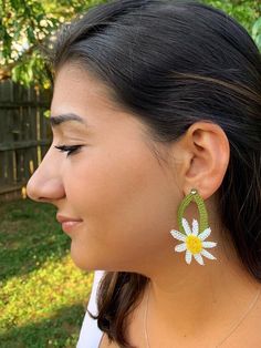 "As H.C. Andersen said  \"Just giving is not enough... One must have sunshine, freedom, and a little flower\"  These white flower dangling earrings is a perfect idea to brighten anyone's day! You can have these daisy drop earring if you were born in April, daisy is your birth flower.  Or just have them because they are lovely! They are made by Turkish needle lace technique which is very similar to tatting. It is a meticulous method for making delicate lace designs. For each motif hundreds of knots are tied with the help of a needle. All of BloomingSpringDesign's products are made in a smoke and pet free environment.  They are designed joyfully and delicately produced. My aim is to make you happy with your purchase, so if you are not fully satisfied with them please contact me. Your purchas Handmade Teardrop Flower Earrings For Summer, Handmade Flower-shaped Earrings For Spring, Handmade Daisy-shaped Earrings For Gifts, Handmade Daisy Shaped Earrings As Gift, Handmade Daisy Earrings As Gift, Handmade Daisy-shaped Earrings As Gift, Handmade Spring Flower-shaped Earrings, Handmade Dangle Flower Earrings For Spring, Spring Teardrop Flower Earrings For Pierced Ears