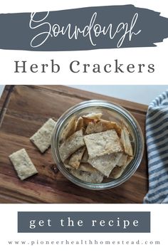 a bowl filled with crackers on top of a wooden cutting board