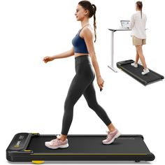 a woman is walking on a treadmill