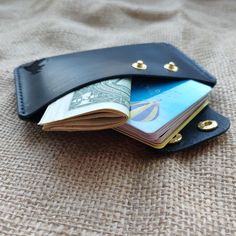 A compact cardholder has only one compartment, which can hold up to 14 cards. Simple and convenient, fits in the pocket of any pants. It is closed on two snaps, stitched manually with a waxed thread. The thread color can be selected in the menu. Made by hand from Italian leather. Cardholder size: 2.76 "x4.33" (7x11 cm) A wonderful gift to yourself or a friend. Trifold Wallets With Card Slots For Daily Use, Everyday Use Trifold Card Holder With Card Slots, Trifold Card Holder With Card Slots For Daily Use, Bifold Card Holder With Card Slots, Trifold Card Holder With Slots As Gift, Bifold Card Holder With Slots For Everyday Use, Envelope Card Holder With Slots For Everyday Use, Bifold Card Holder With Card Slots For Personal Use, Bifold Card Holder With Card Slots As Gift