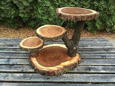 three tree stumps stacked on top of each other