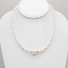 What can you always count on? Pearls to remain timeless year after year. Necklace is made with 6mm freshwater pearls and an 8mm pearl in the center centered between 14k gold filled rondelles. Necklace is finished with spring ring clasp. Measures 16 and 18 inches in length. Year Necklace, Freshwater Pearl Necklaces, Jewelry Cleaner, Gold Filled Jewelry, Spring Rings, Fresh Water, Freshwater Pearls, Gold Filled, Pearl Necklace