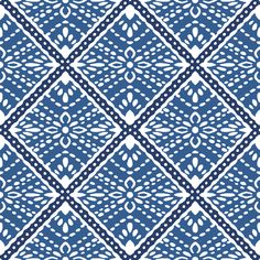 a blue and white pattern that looks like it has been made from fabric or paper