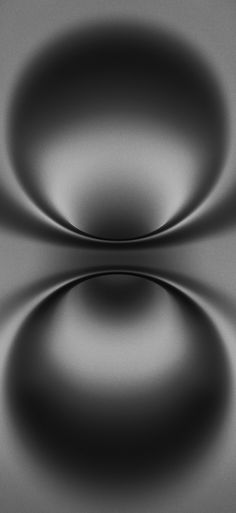 an abstract black and white photo with circular shapes