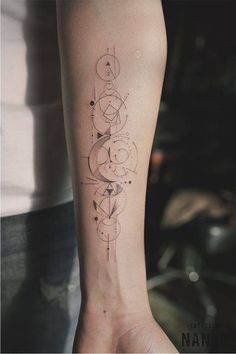 a woman's leg with a tattoo on her left arm and the word love written in