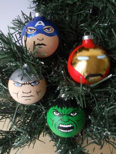 the avengers ornaments are hanging on the christmas tree