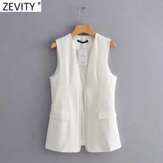 Brand Name: ZEVITYSeason: Spring/AutumnPattern Type: SolidMaterial: PolyesterMaterial: MicrofiberMaterial: AcetateStyle: Office LadyOrigin: CN(Origin)Model Number: CT704Decoration: PocketsClothing Length: RegularGender: WOMENStuffing Percentage: 50%,70%Age: Ages 18-35 Years OldCollar: V-NeckItem Type: Outerwear CoatsClosure Type: Open StitchPercentage of Material: 30%,50%Outerwear Type: Vest Sleeveless Vest Jacket, Suit Waistcoat, Casual Outerwear, Casual Vest, Vest White, Fashion Black, Office Casual, Sleeveless Vest, Office Ladies