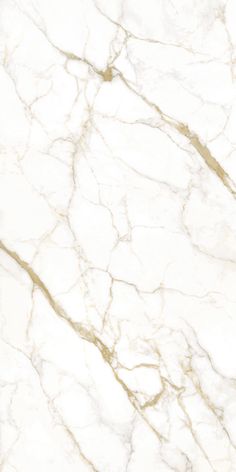 a white marble textured surface with gold veining