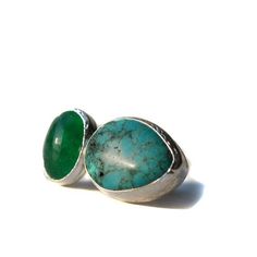 This Ring is hand crafted with pure and sterling silver. This ring is designed with a turquoise and jade stone.Size: Please tell me your ring size during checkout and I will prepare it accordingly. You can later adjust this ring one size up which will also give you the flexibility to wear this ring on both the ring and the middle finger.. Please allow me a week to prepare it for shipping after your order.I ship my items well-cushioned, inside a bubble mailer in organze gift pouches or gift boxes Green Turquoise Ring With Natural Stones, Green Polished Turquoise Ring, Green Turquoise Ring With Polished Finish, Unique Green Polished Turquoise Ring, Unique Green Turquoise Ring With Polished Finish, Green Chrysocolla Rings With Natural Stones, Turquoise-colored Sterling Silver Ring For Anniversary, Green Sterling Silver Turquoise Ring For Anniversary, Silver Turquoise Ring With Cabochon Chrysoprase