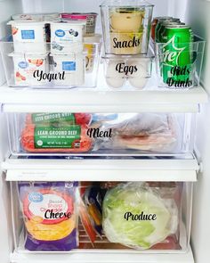 an open refrigerator filled with lots of food and condiments on top of it