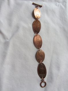 Pressed Penny Bracelet, Smashed Penny Jewelry, Hammered Penny Jewelry, Pressed Penny Jewelry, Pressed Penny Display Ideas, Pressed Penny Tattoo, Pressed Pennies, Penny Jewelry, Penny Bracelet