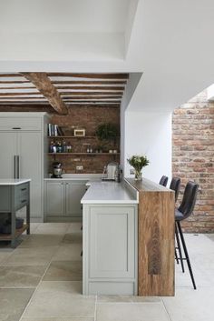 the kitchen is clean and ready to be used as a dining room or office area