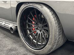 the rims and tires of a sports car